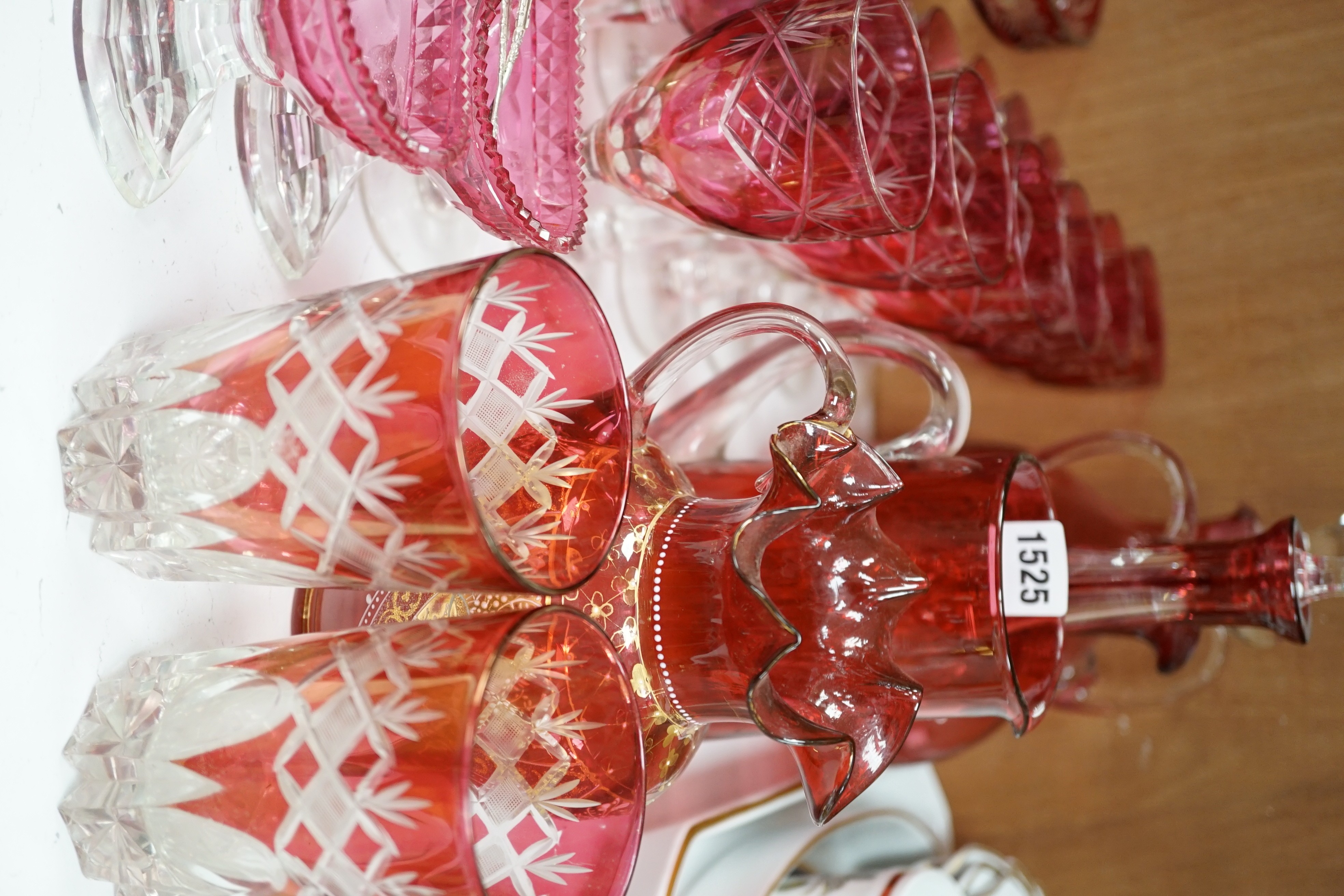 Red glasswares and six various cranberry coloured glass jugs, etc. 19th/early 20th century